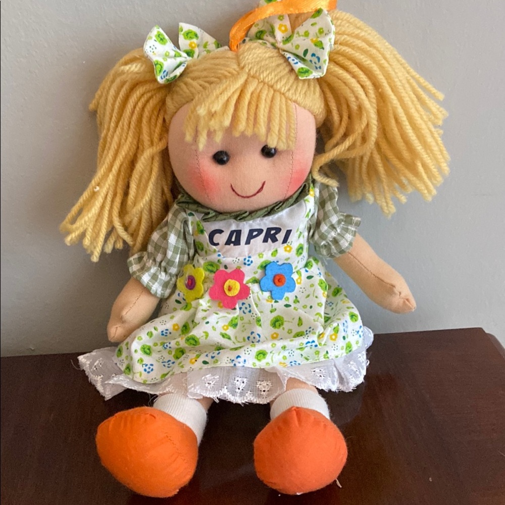 Collectible rag doll with Floral dress and Orange Shoes imported from Germany